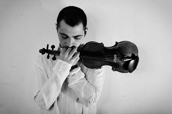  Даниил Коган  (скрипка) участник Благотворителього концерта  в Соборной Палате  25 декабря 2019 года