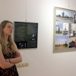 Даниэла Рябичева, внучка Дмитрия (Даниила) Рябичева у стендов выставки проекта "Династия продолжается"